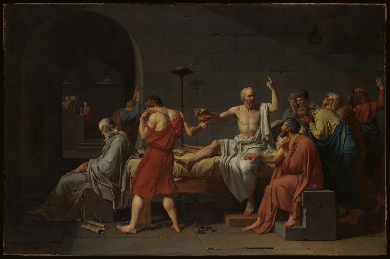 Socrates seated on a bed, reaching for a cup while raising one hand, surrounded by his followers.